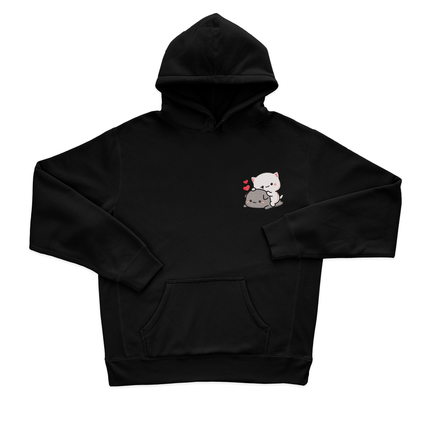 Білий котик сидить на сірому